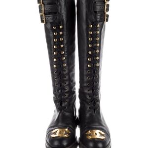 CHANEL Black Leather Knee-High Boots with Gold Accents